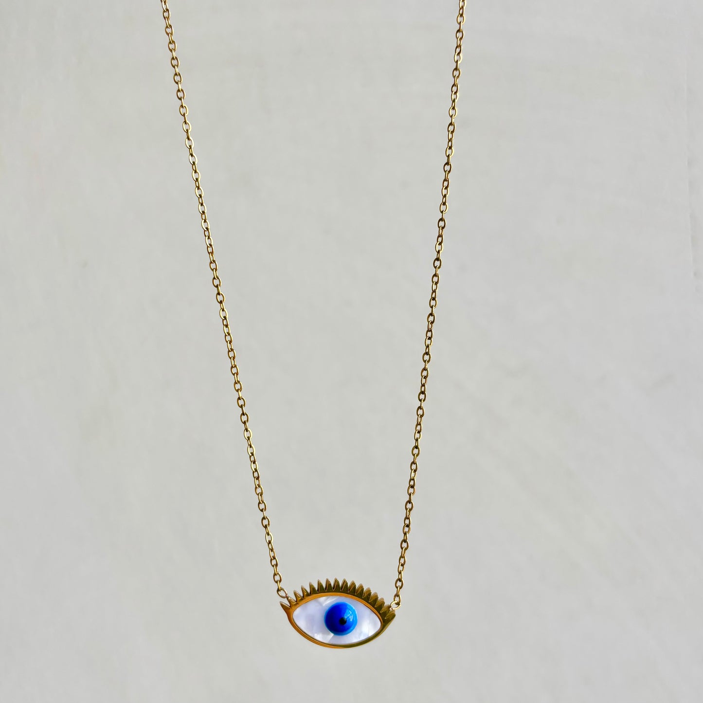 Nazar with Gold Lashes