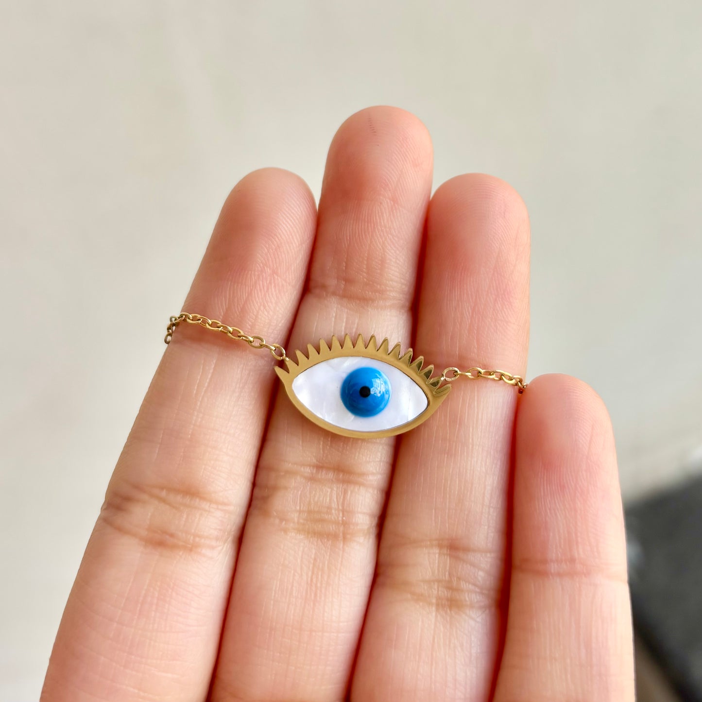 Nazar with Gold Lashes